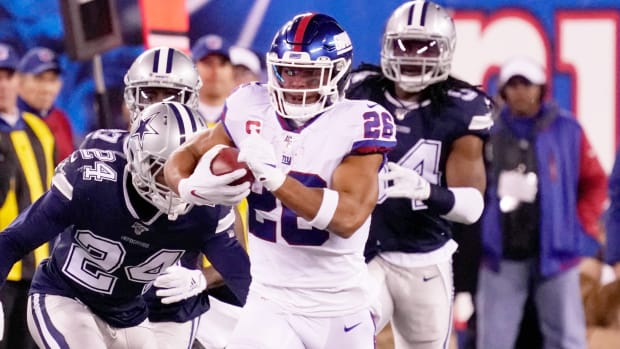 Nov 4, 2019; East Rutherford, NJ, USA; 
New York Giants running back Saquon Barkley (26) runs for a 65 yard 1st down ion the 4th quarter at MetLife Stadium. Mandatory Credit: Robert Deutsch-USA TODAY Sports